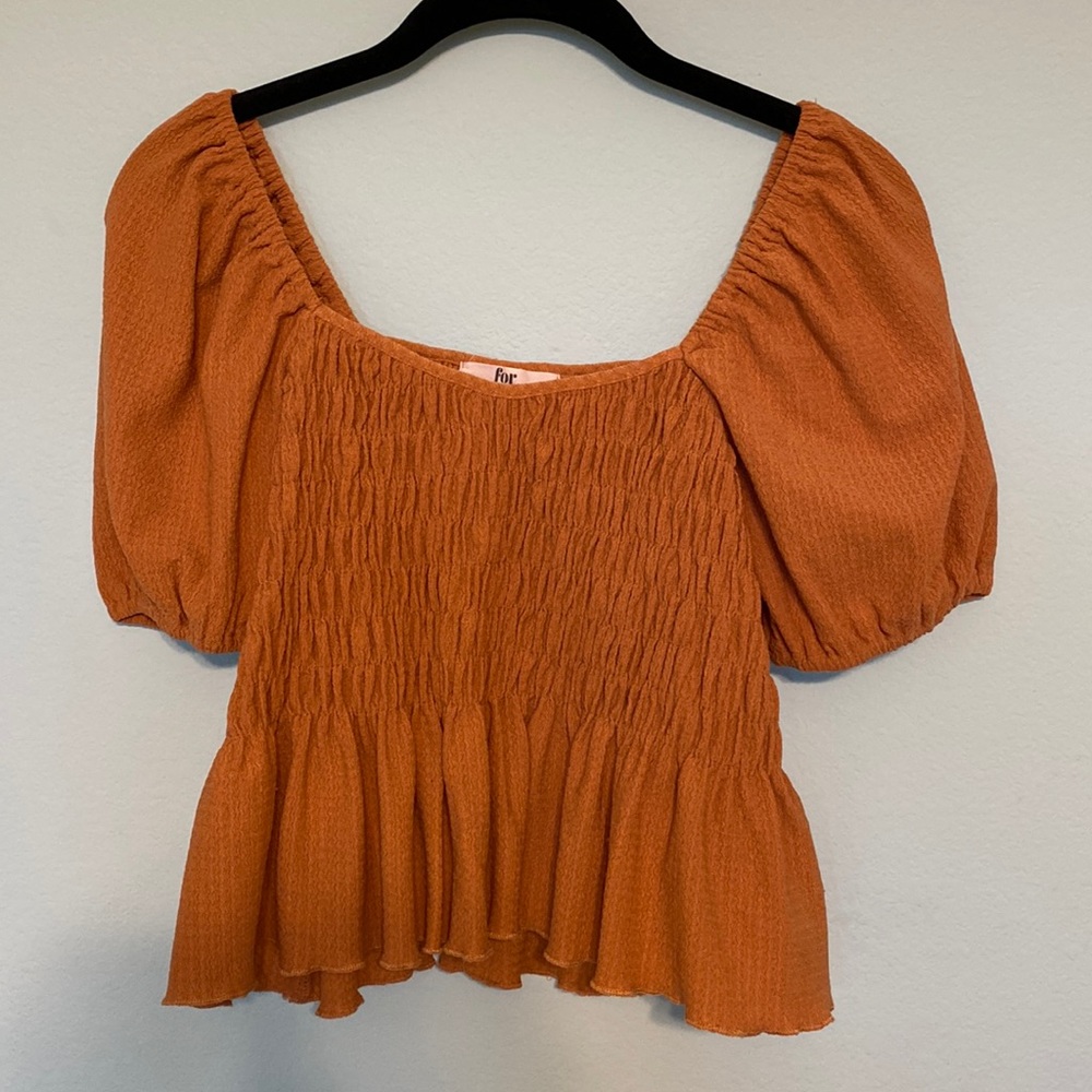 Rust color top by For Good. Size small.